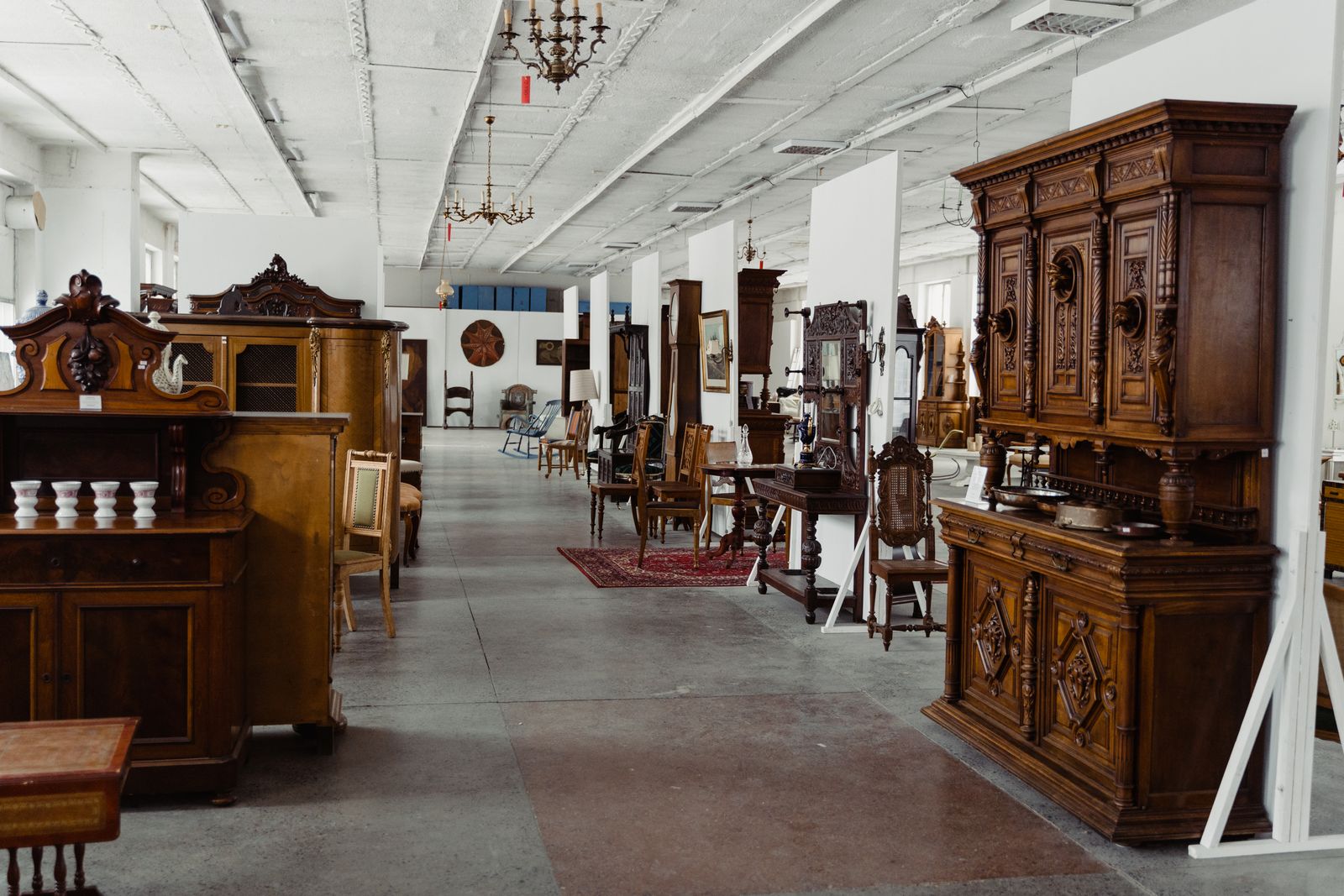 Showroom of antique wooden furniture valued for resale